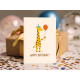 Листівка Жираф з кулькою та надписом "Happy Birthday"